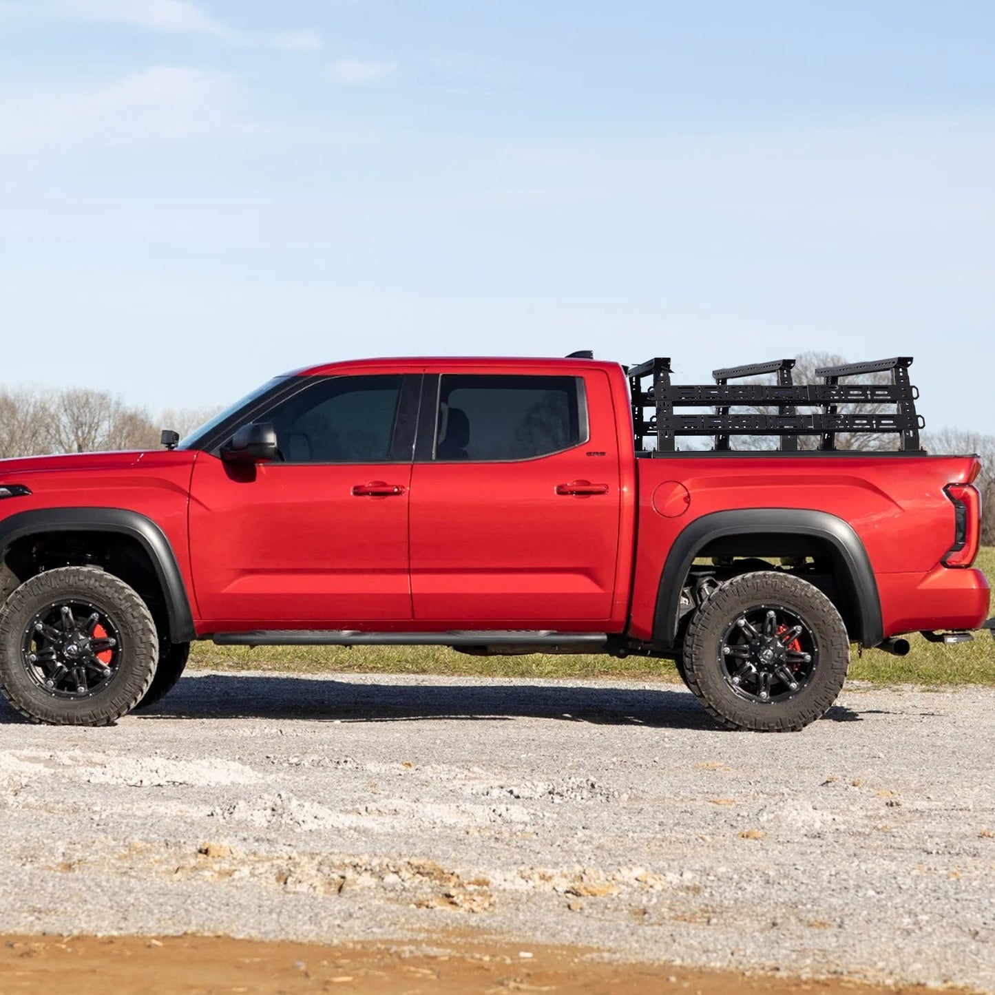 Truck bed rack showing fit and compatibility with pickup truck for outdoor gear.