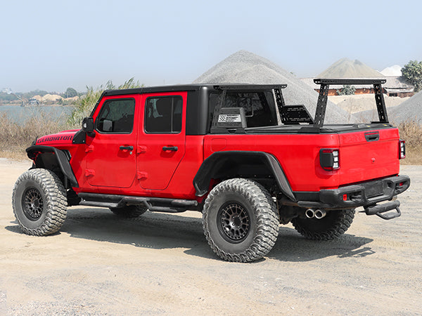 Rear view of pickup truck with installed bed rack in outdoor setting