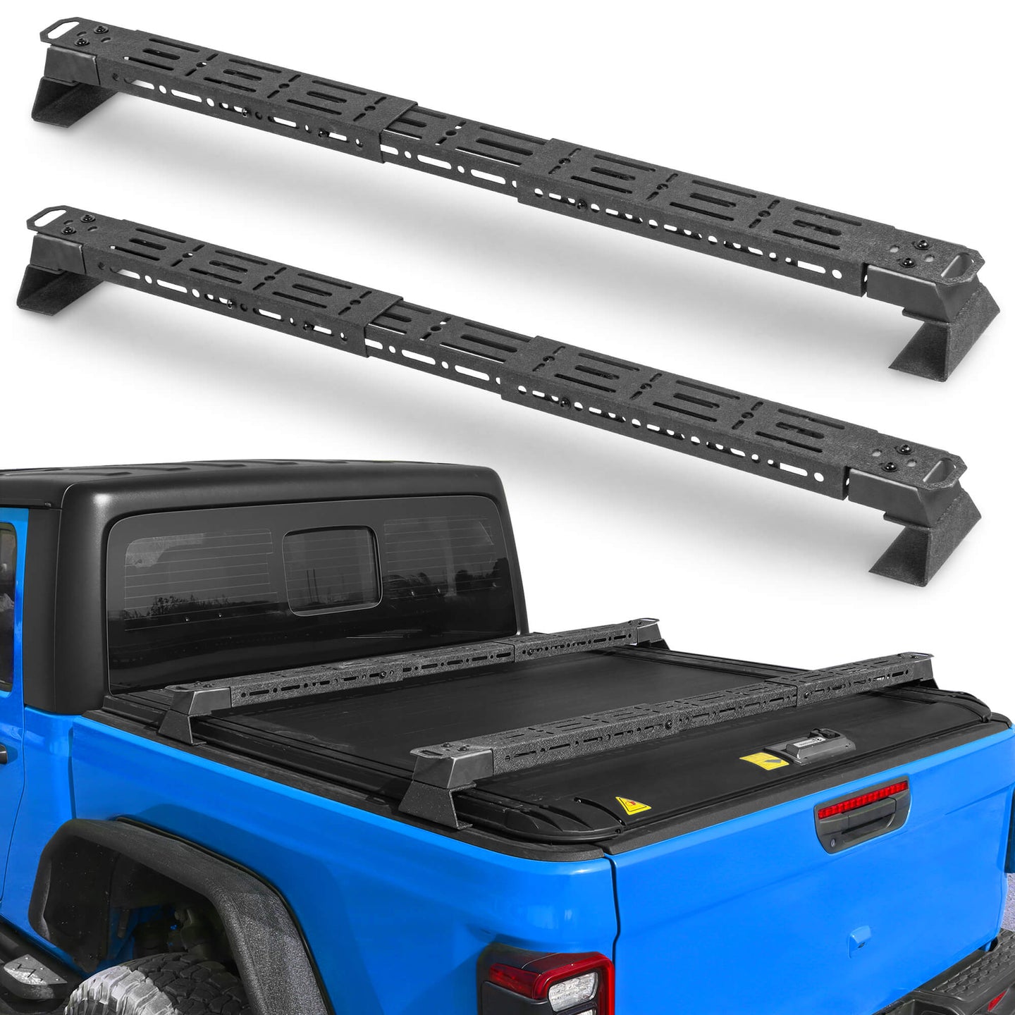 Truck bed rack installed on pickup truck roof for gear storage.