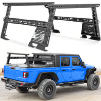 Side view of a truck bed rack with US flag, showing sturdy design and gear-ready setup.