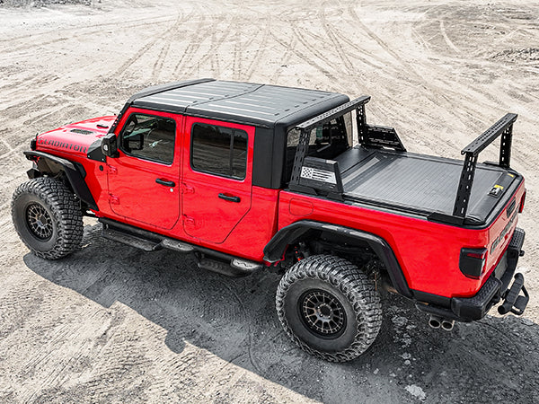 Pickup truck with installed bed rack in an outdoor setting